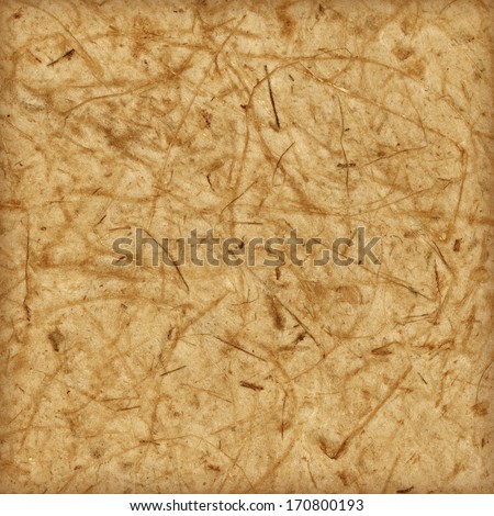 Closed up brown mulberry paper with wood pulp background