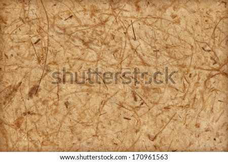 Closed up brown mulberry paper with wood pulp background