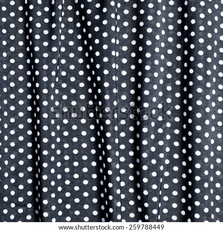 black and white polka dot background