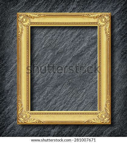 gold frame on  black slate background
