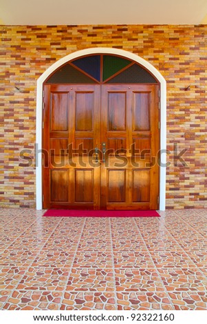 Entrance and wooden door framed