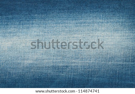 Blue jeans background witha a shabby middle