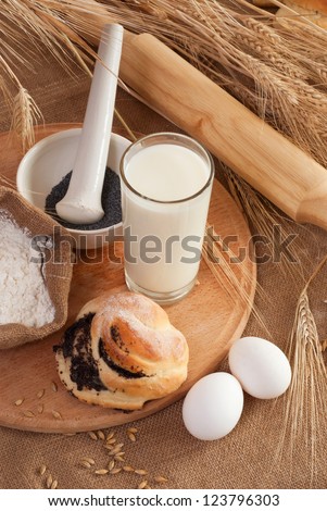 still life with Fresh buns and egg, milk