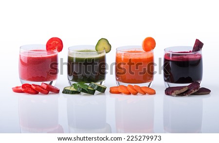 Vegetable juice (carrot, beet, cucumber, tomato). Isolated on white background with clipping path included