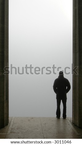 Man looking in the Fog