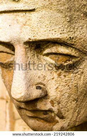 detail of a sandstone face sculpture