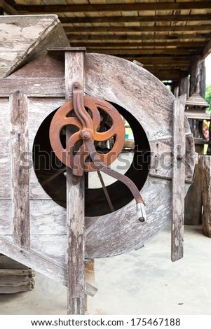 Close up of old Asian style wooden rice mill