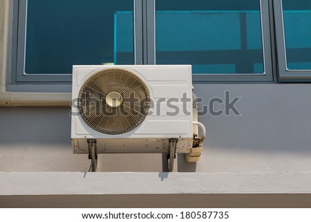 Wall mounted fan coil unit of air conditioner, installing outside of building