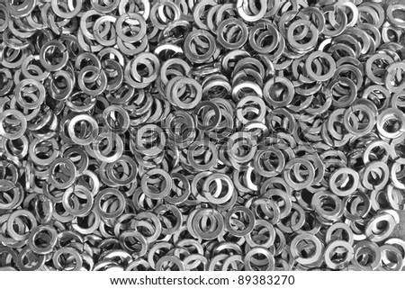 Pile of stainless steel spring washers, a shop floor item