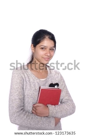 Pretty Indian/ Asian college student over isolated white background.