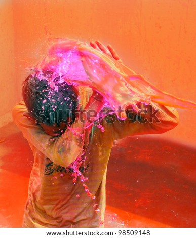 Holi celebrations Splash of colorful water on Holi festival Holi celebrations Splash of colorful water on Holi festival