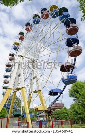 Ferris wheel against a blue sky