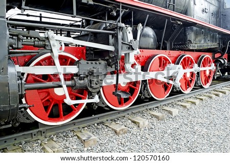 Vintage steam locomotive. The steam locomotive wheels close-up
