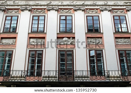 Beautiful facade of the building in Lvov city (Ukraine) with bas-reliefs