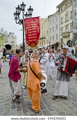 LVOV, UKRAINE - APRIL 24: Lviv have a Hare Krishna who arrange songs and dances in the center of town on April 24, 2013 in Lviv, Ukraine