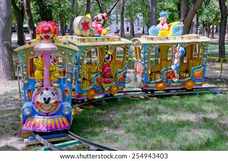 FEODOSIA, CRIMEA, RUSSIA - JUNE 13:  Children\'s attraction - the train, for entertainment in central park on June 13, 2014 in Feodosia, Crimea, Russia