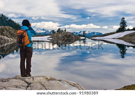 Hiker at Lake Ann, Mt Baker, Washington