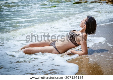 Beautiful  woman on peep in beach