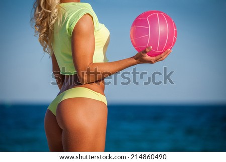 young beautiful girl outdoor in volleyball game