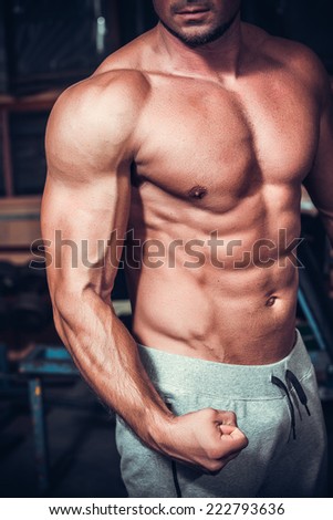 beautiful and strong young muscular guy
