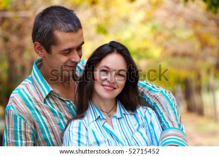 lovely couple in autumn park