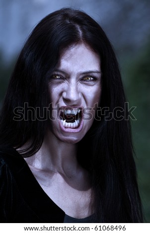 Portrait vampire at a moonlight