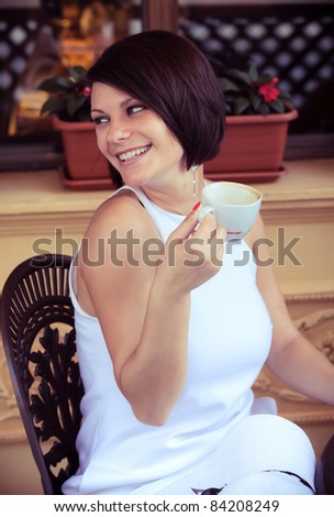 Lovely lady with coffee cup
