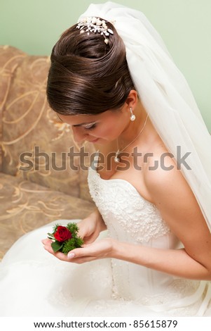 Portrait of beautiful young bride with wedding hairstyle