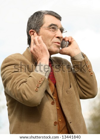 The man speaks by phone