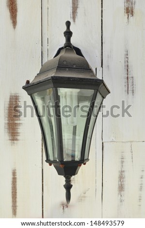 Vintage lantern on a wall