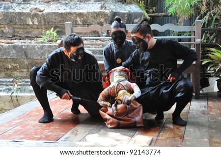 BANGKOK, THAILAND - DEC 18 : The little Thai puppet play requires the synchronized efforts of three puppeteers. They play at Klong Bang Loung on DEC 18, 2011 in Bangkok Thailand
