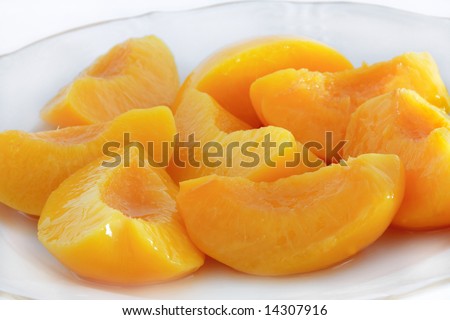 Sappy pieces of the peach-tree on the plate