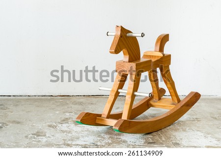 Cute vintage classic rocking horse chair children could enjoy the riding on white background