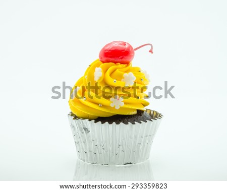 colorful cupcakes with beautiful decoration over white background
