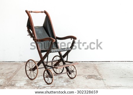 classical old vintage style stroller in vintage room