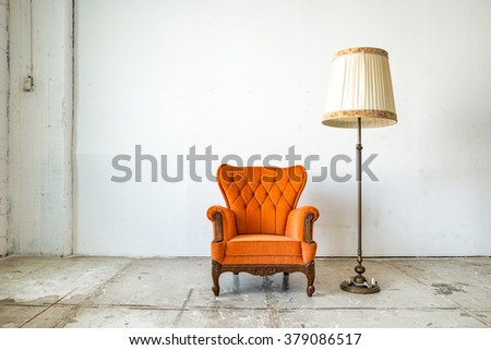 Classical style Armchair sofa couch in vintage room with desk lamp