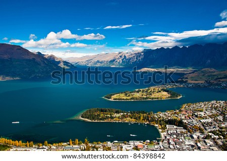 closeup of queenstown with lake Wakatipu from top at noon.