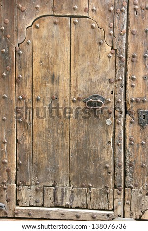 old wooden door in the beautiful village of cadaques (Costa Brava, Spain).