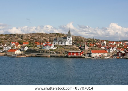 little town of sweden with small red wooden houses, skarhamm, sweden