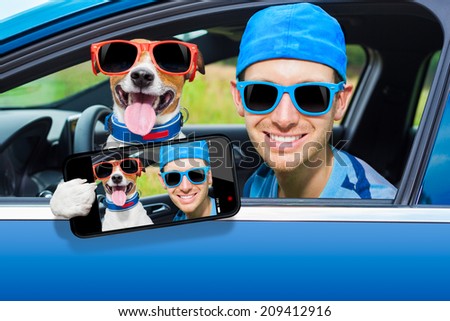 dog in a car looking through window with Driving instructor taking a selfie
