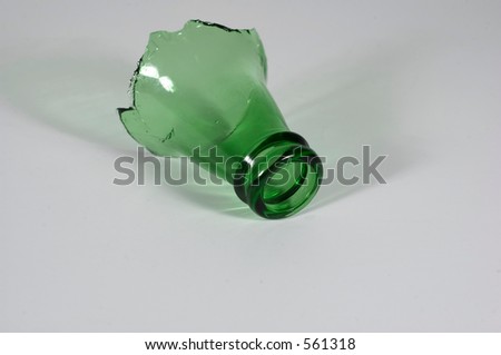 A broken green glass bottle top