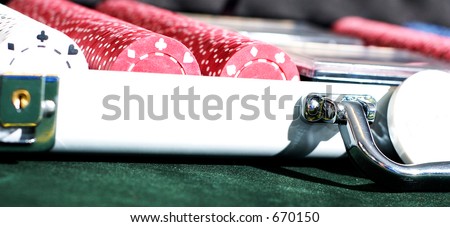 A brightly lit case of poker chips