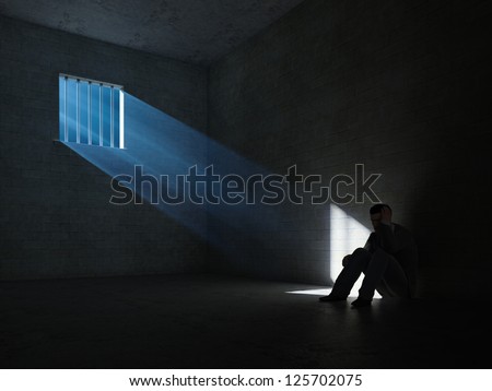 Inside of a dark prison cell