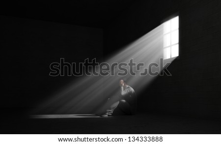 A lonely man in a dark room A lonely man in a dark room