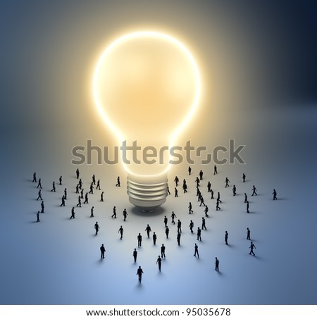 A group of tiny people walking towards a light bulb A group of tiny people walking towards a light bulb