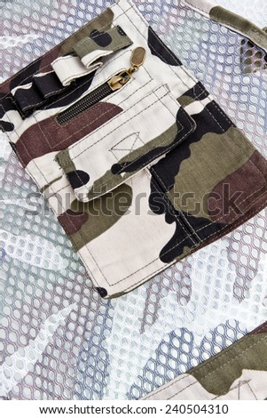 Camouflage vest pocket background