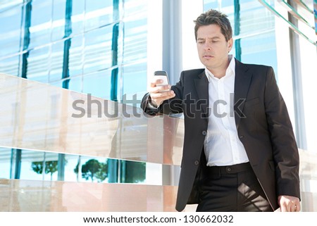 Portrait of a professional business man holding a \