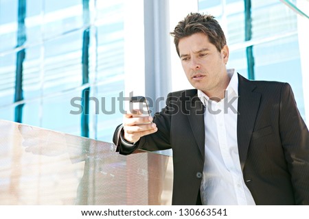 Close up portrait of a professional business man holding a \