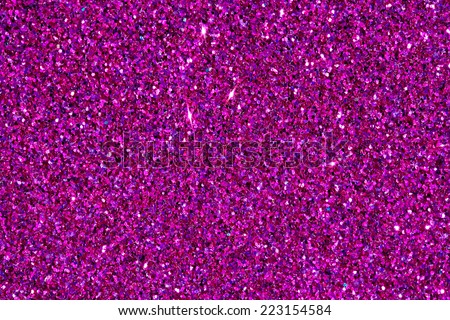 Abstract detail background of a vivid bright pink glitter shining and sparkling with texture. Galaxies and stars, full frame magenta noise color backdrop element.