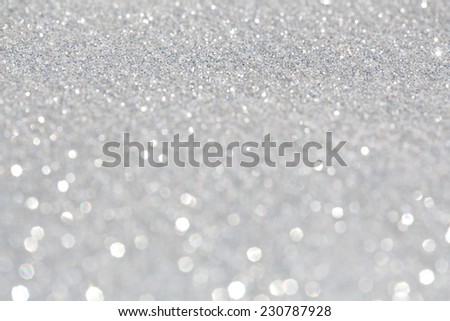 Abstract glitter festive silver background frame with shining stars and galaxy like feel. Christmas decorative and festivity celebration background texture. Luxury texture white glitter.